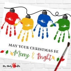 a christmas card with three hand prints and the words may your christmas be merry & bright