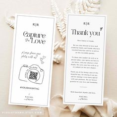 two white bookmarks with the words capture the love on them