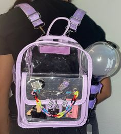 "ORDER NOW SHIPS WITHIN ONE WEEK New BTS inspired stadium backpack featuring PU leather with canvas material on the backpack straps. Features purple Velcro straps on the side to strap in your army bomb to be concert ready!! Comes with a purple chain and removable insert in the first pocket for pin display! All backpacks can add on customizable chain! Please enter \"I understand\" into the personalization box and message me with your order number for what you would like on the chain! You have a c Trendy Purple Backpack For Daily Use, Purple School Bag With Adjustable Strap, Trendy School Backpack With Clear Strap, Purple Bag With Adjustable Strap For Back To School, Purple Everyday Backpack With Adjustable Strap, Back To School Purple Bag With Adjustable Strap, Everyday Purple Backpack With Adjustable Strap, Purple Back To School Bag With Adjustable Strap, Streetwear Backpack With Adjustable Straps