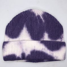 a purple and white tie - dyed beanie hat