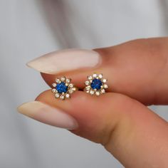 Yellow gold, white diamond and blue sapphire Material: Solid Gold (not gold plated or gold filled) Available Gold Color: Yellow gold, rose gold and white gold Karat: 14 K (585) Diamond weight: 0.05 ct Blue sapphire: 0.05 ct 1 piece of earrings for gold grams: 0.60 gr Diamond color: F-G Color Made to order I design my products with modernity and elegance suitable for daily use and special occasions. ★ ★ ★ I ship my products in a gift box. A tool and gift to make your loved ones and yourself happy Fine Jewelry Gold Ring With Lab-created Sapphire, Gold Jewelry With Lab-created Sapphire For Anniversary, Gold Jewelry With Round-cut Lab-created Sapphire, Gold Jewelry With Round Cut Lab-created Sapphire, Gold Jewelry With Lab-created Sapphire Birthstone, Gold Round Cut Lab-created Sapphire Jewelry, Gold Birthstone Jewelry With Lab-created Sapphire, Yellow Gold Lab-created Sapphire Jewelry Gift, Gold Lab-created Round Cut Sapphire Jewelry