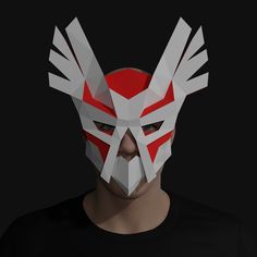 a man wearing a mask with white and red designs on it's face, in front of a black background