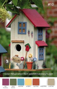 two bird houses are shown in front of some trees