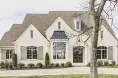 a large white house with lots of windows