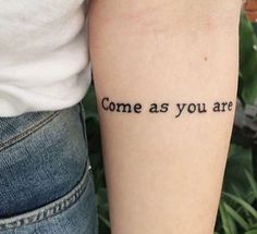 someone with a tattoo that says, come as you are on their left arm and the word