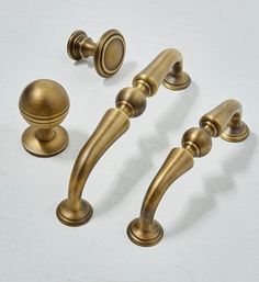 an assortment of antique style handles and knobs