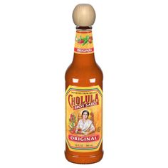 a bottle of hot sauce on a white background