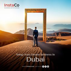 a man standing on top of a desert next to an open doorway with the words, setup your dream business in dubai