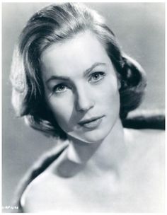 an old black and white photo of a woman