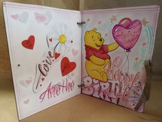 a winnie the pooh birthday card is open