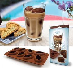 an ice cream sundae, cookie and drink on a table next to a package of cool beans