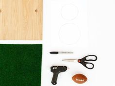 the supplies needed to make this football craft are laid out