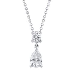 From the REEDS Roberta Z Diamond Collection, this 14k white gold pendant drop necklace features a pear cut diamond dropping from a round cut diamond. Diamonds are 1/2ctw, I in color, and I1 in clarity. The chain fastens with a lobster-claw clasp and can be worn at 16, 17, or 18 inches in length. In every woman, there's a quiet confidence and an unshakeable sense of who she is. In every woman, there's a heart brimming with love, generosity, and grace. In every woman, there's a passion burning, a Luxury Diamond Cut Pendant Drop Necklace, Quiet Confidence, Wedding Day Jewelry, Trending Engagement Rings, Ring Trends, White Gold Pendant, Diamond Collection, Pear Cut Diamond, Family Jewellery