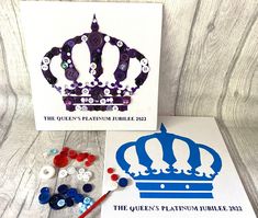 the queen's tiara is next to buttons and a card that says, the queen's platform jubilee 2012