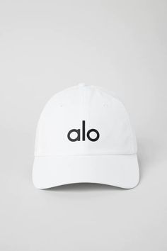 Performance Off-Duty Cap - White | Alo Yoga Sporty Logo Hats For Sports, Classic Six-panel Dad Hat For Sports, Sporty Logo Sports Hat, Casual Golf Baseball Cap With Curved Bill, Casual Curved Bill Baseball Cap For Golf, Sports Baseball Cap With Logo Curved Visor, Sporty Adjustable Logo Baseball Cap, Sporty Golf Hat With Curved Brim, Sporty Adjustable Baseball Cap With Logo