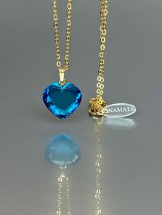 Gorgeous sparkly London blue topaz heart pendant necklace. The Faceted heart shape pendant is flawless and has and has the most vivid blue color that brings lots of depth to the stone and reflects lights beautifully. The pendant is strung on a 14K goldfilled chain. It is perfect for layering or looks great when worn alone. *Excellent qualityAAA+ Flawless London blue topazt Heart Shape Pendant *Pendant measure: 17mmx17 mm /0.7x 0.7 inch *Metal: 14K gold-filled/ Sterling Silver *necklace length: 4 Sapphire Heart Pendant With Heart Charm, Sapphire Necklace For Valentine's Day Gift, Blue Heart Cut Jewelry For Gift, Elegant Blue Heart Necklace With Birthstone, Elegant Blue Birthstone Heart Necklace, Sapphire Heart Pendant Necklace With Heart Charm, Blue Heart Cut Jewelry With Heart Charm, Blue Gemstone Heart Necklace For Gift, Blue Heart Shaped Birthstone Necklace