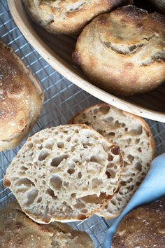 several loaves of bread on a cooling rack