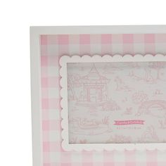 Celebrate your cherished memories with our Pink Gingham Photo Frame, available in 2 sizes. The timeless design and delightful pattern add charming warmth to your home while preserving your special moments. Perfect for adding joy and nostalgia to any room. Sold individually - select from 4" x 6" or 5" x 7" size 4x6 picture frame measures - 7 1/2" W x 1" D x 9 1/2" H 5x7 picture frame measures - 8 1/2" W x 1" D x 10 1/2" H A design that never goes out of style and adds a touch of whimsy to any room. Stands horizontally and vertically. Makes a thoughtful and sentimental gift Green Chinoiserie, Linen Guest Towels, 5x7 Picture Frames, 4x6 Picture Frames, Gift Wrap Tags, Pinterest Room Decor, Soft Pink Color, Gingham Pattern, Host Gifts