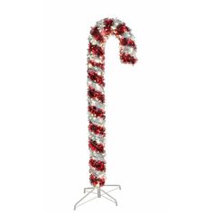 a candy cane decorated with red and white tinsel