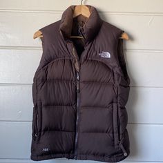 North Face Small Brown Nuptse Vest Coat 96 Retro 700 Goose Down Puffer Jacket Sp Embroidered Logo Front And Back Side Zipper Pockets Zipper Closure Mock Neck High Neck Fall Winter 700 Goose Down Snow Cold Weather Rare Hard To Find Limited Edition Instagram Blogger Fave Blogger’s Fave Fashion Bomber Puffer Brown 90’s Y2k Approx 24.5” Length Approx 20” Pit To Pit Ripped On Inside By Pocket As Pictured Brown Vest Women, Brown North Face, Coats North Face, North Face 700, Brown Puffer, 90s Fits, North Face Nuptse, North Face Vest, North Face Coat