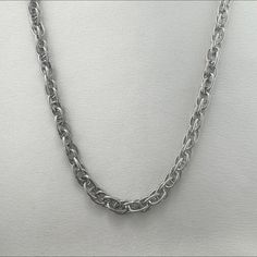 Elevate your street style with our Link Chain Necklace for Men and Women. This hip hop accessory boasts a simple twist design, adding a touch of uniqueness to any outfit. Made for both men and women, it's a versatile piece perfect for any fashion-forward individual. Necklace length 22.0 inch, Chain width 6 mm. Silver Stainless Steel Chain Necklace For Streetwear, Streetwear Stainless Steel Silver Chain Necklace, Casual Chunky Chain Link Jewelry, Stainless Steel Chain Link Necklace For Streetwear, Casual Link Chain Jewelry, Streetwear Stainless Steel Chain Necklace With Adjustable Chain, Casual Chain Link Jewelry, Adjustable Stainless Steel Chain Necklace For Streetwear, Stainless Steel Adjustable Chain Necklace For Streetwear