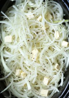 shredded white onions and tofu in a slow cooker