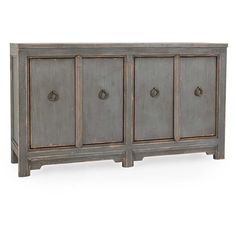 the sideboard is made from wood and has three doors on one side, two drawers on