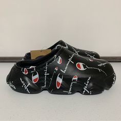 Champion Super Meloso Warped Clog Shoes -Size 5 Youth (6.5 Women’s) -Black/White -Eva Upper -Eva Sole -Textile Lining -New With Tags -New Without Box Sporty Synthetic Slip-on Clogs, Casual Non-slip Low-top Clogs, Casual Black Breathable Clogs, White Breathable Sports Clogs, Rubber Sole Clogs For Streetwear, Sporty Slip-on Clogs With Round Toe, Closed Toe Rubber Sole Clogs For Streetwear, Black Slip-resistant Sports Clogs, Slip-on Synthetic Low-top Clogs