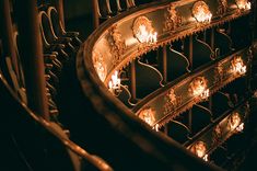 a spiral staircase with lit candles on it