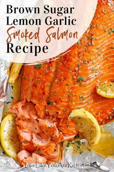 salmon in foil with lemon slices and garnish on top, text reads brown sugar lemon garlic smoked salmon recipe