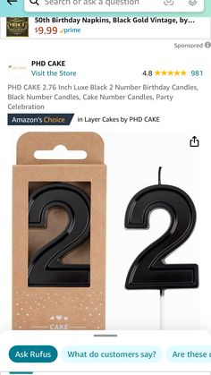 two birthday candles are on the amazon page