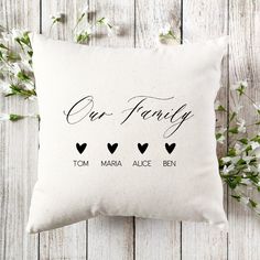 a personalized pillow that says our family, tom, marina lucky and paw prints