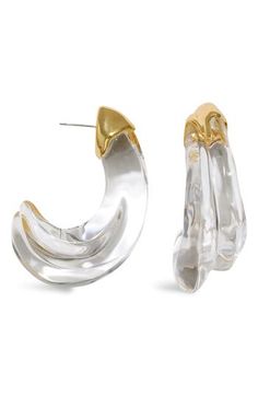 Hand-sculpted Lucite hoop earrings in a clear-liquid silhouette glimmer in the light, while the 14-karat gold-plated molten-inspired detail adds rich texture. 2" drop; 3/4" width Post back Lucite/14k-gold plate Imported Modern Small Hoop Jewelry In Clear, Modern Small Hoop Clear Jewelry, Modern Lucite Earrings, Modern Clear Small Hoop Jewelry, Modern Clear Hoop Earrings For Pierced Ears, Modern Clear Hoop Earrings, Elegant Clear Hoop Earrings For Party, Modern Clear Earrings For Formal Occasions, Modern Small Hoop Clear Earrings