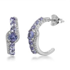 Accessorize in style with these Sterling Silver Tanzanite & Cubic Zirconia C-Hoop Earrings. Click on this JEWELRY & WATCHES GUIDE to learn about fit, styles, materials and more! Accessorize in style with these Sterling Silver Tanzanite & Cubic Zirconia C-Hoop Earrings. Click on this JEWELRY & WATCHES GUIDE to learn about fit, styles, materials and more! FEATURES Dimensions: 18 mm Backings: post Metal: sterling silver Plating: rhodium Finish: polished Packaging: boxed Nickel safe ImportedSTONE DE Diamond Gemstone Hoop Earrings, Formal Cubic Zirconia Gemstone Hoop Earrings, Anniversary Tanzanite Earrings With Prong Setting, Classic Silver Tanzanite Earrings, Formal Silver Gemstone Hoop Earrings, Tanzanite Jewelry With Matching Earrings For Anniversary, Silver Tanzanite Earrings For Wedding, Tanzanite Jewelry Set With Matching Earrings For Anniversary, Tanzanite Jewelry Set For Anniversary