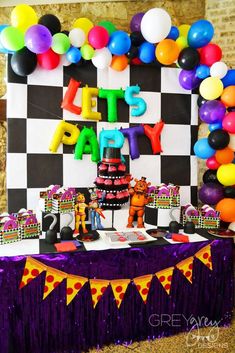 a birthday party with balloons and decorations