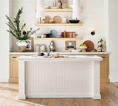 the kitchen is clean and ready to be used as a dining room or family room