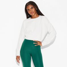 Standard-fit pullover sweater in a solid color from Wild Fable™. Designed with a cropped silhouette. Made from recycled polyester-nylon blend jersey fabric with added spandex. Features a crewneck style with ribbed sleeves. If you're not satisfied with any Target Owned Brand item, return it within one year with a receipt for an exchange or a refund. Wild Fable™: A look for every story. White Stretch Sweatshirt For Fall, White Relaxed Fit Cropped Sweater, White Stretch Crop Top For Fall, White Cropped Relaxed Fit Sweater, High Stretch White Crop Top For Fall, Versatile Stretch Sweatshirt For Fall, Solid Cropped Sweatshirt For Fall, White Cropped Relaxed Fit Sweatshirt, Sporty Relaxed Fit Crop Top For Fall