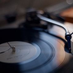 an old record player with its turntable spinning