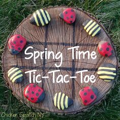 a sign that says spring time tic - tact toe with ladybugs on it