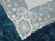 "Exquisite antique vintage LINEN white bridal hanky with a beautiful needle run embroidery net lace that features a lovely graceful floral & leaf design . In very nice vintage condition- no holes or stains. approx measurements-13\" square Simply exquisiteThis exceptional HANKY is certain to become a family heirloom Thank you for shopping Forever Chic Textiles!" Lace Handkerchiefs With Lace Trim For Wedding, Lace Wedding Handkerchiefs With Lace Trim, Lace Wedding Handkerchiefs With Lace Work, Wedding Lace Handkerchief With Lace Work, Wedding Handkerchiefs With Lace Work, Vintage Embroidered Lace For Wedding, Embroidered Lace Handkerchiefs For Wedding, White Lace Handkerchiefs With Embroidery, White Embroidered Lace Handkerchiefs