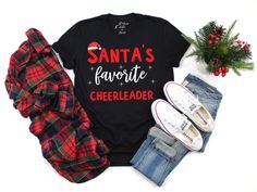 Cheerleader Christmas Shirt is perfect for your favorite cheerleader! Perfect gift from Cheerleader mom to the Cheer team or Cheer Squad for Christmas gifts! Features High Quality DTG Printing! 100% ring-spun cotton (heather colors contain polyester). Style We offer Unisex T-shirts, Unisex Long Sleeve Shirt, Unisex Sweatshirts, Unisex Hoodies, and Youth T-Shirt Sizes. Sizing Please refer to size guide in the photo of listing. Care Instructions High Quality Shirts will last for years under normal Meet Me Under The Mistletoe, Christmas Vacation Shirts, Pom Pom Girl, Cute Christmas Shirts, Under The Mistletoe, Athletic Training, Merry Christmas Shirts, Xmas Shirts, Funny Christmas Shirts