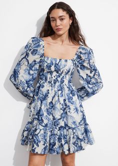 Puff sleeve mini dress featuring a square neckline and frilled cuffs.• Sleeves can be worn off-shoulder• Smocked back panel• Length of dress:66cm / 26" (EU 36 / UK 10 / US 4) Chic Mini Dress With Smocked Bodice And Puff Sleeves, Chic Puff Sleeve Dress With Ruffles And Square Neck, Spring Dress With Smocked Cuffs And Square Neck, Fitted Puff Sleeve Dress With Ruffles And Straight Neckline, Summer Square Neck Dress With Smocked Cuffs, Spring Puff Sleeve Mini Dress With Smocked Cuffs, Spring Mini Dress With Puff Sleeves And Smocked Cuffs, Brunch Mini Dress With Smocked Bodice And Puff Sleeves, Brunch Smocked Dress With Square Neck And Smocked Cuffs