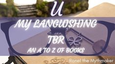 a pair of glasses sitting on top of a book with the words u my laughing tbr an at to z of books