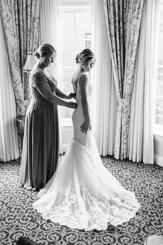 two brides getting ready for their wedding at the grand america hotel in new york city