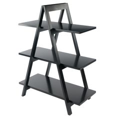 The Aaron shelf features an exciting, modern design with A-frame shelves that are ideal for storing, displaying books and more. The shelf will provide your home with a great practical accent piece. Shelf dimension is 30.1 In. W x 12.1 In. D. distance between shelves is 11.9 In., static load is 50 lbs per shelf. Made of solid wood frame and MDF shelves in a black finish. Conveniently packed and shipped in 1 box and ready to assemble. Winsome Wood Aaron Black 3-Shelf Ladder Bookcase (30.1-in W x 3 A Frame Shelf, Modern Shelving Units, Book Display Shelf, Utility Shelves, Unique Shelves, Frame Shelf, Ladder Shelf, Modern Shelving, Ladder Bookcase