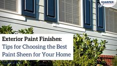 an exterior paint finishes sign in front of a house with blue shutters and green plants