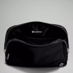 Black Lululemon Belt Bag Phone, Keys, Wallet, Plus A Little Extra. This Large Version Of Our Everywhere Belt Bag Has The Same Great Shape, With An Added Litre For Your Essentials. Sporty Everyday Bag With Zipper Pouch, Sporty Everyday Zipper Pouch Bags, Sporty Black Bag With Zipper Pouch, Black Everywhere Belt Bag Lululemon, Black Lululemon Belt Bag, Lululemon Functional Belt Bag For On-the-go, Black Lululemon Bag For On-the-go, Lululemon Shoulder Bag With Removable Pouch For On-the-go, Lululemon Belt Bag