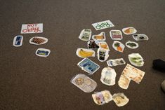 there are many stickers and magnets on the floor