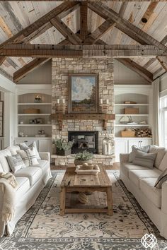 a living room with two couches and a coffee table in front of a fireplace