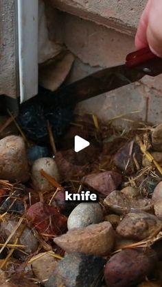 a person is cutting rocks with a knife